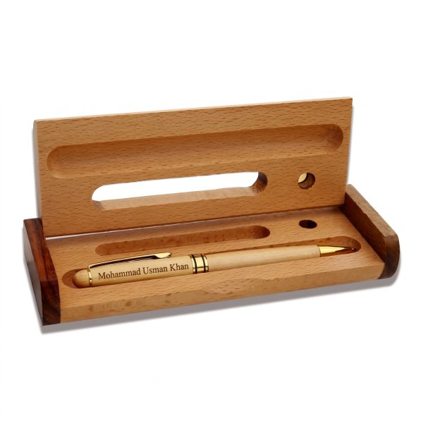 Handcrafted wooden pen case open showing custom engraved pen in molded horizontal tray