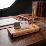 Customized wooden pen stand with visiting card holder engraved with name on executive office desk