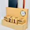 Wooden desk organizer on office desk with calendar